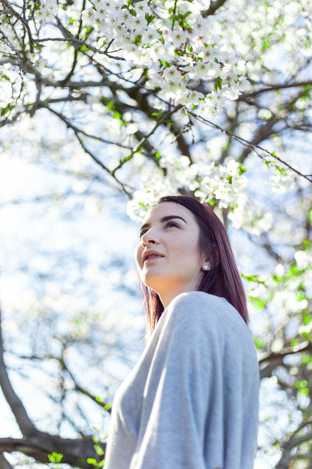 Portrait of a Middle Eastern-Canadian woman traveler smiling outdoors